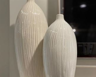Pair of decorative white vases.