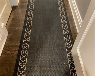 All-weather runner. Measures 8' x 2' 8".