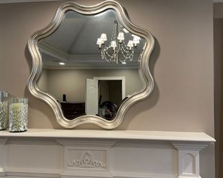 Wavy decorative mirror. Measures 34" D. Photo 1 of 2.