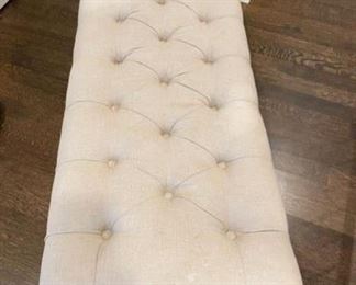 Linen upholstered bench with nailhead trim and lucite legs. Measures 48" x 18" D x 18" H. Photo 2 of 3.