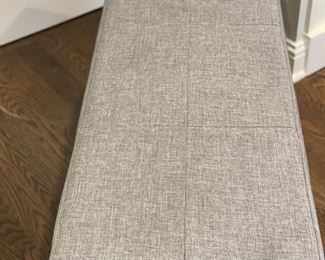 Upholstered bench with chrome cross-leg base. Measures 40" W x 18" D x 18" H. Photo 2 of 3.