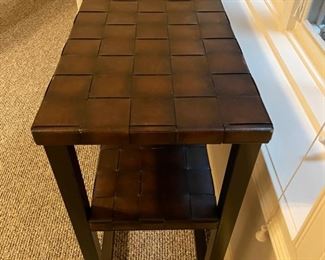 Console with woven leather shelves. Measures 54" W x 18" D x 31"H. Photo 3 of 3.