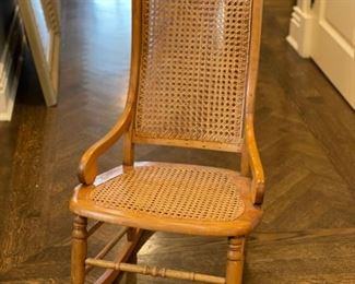 Child's cane seat & back rocker. Photo 1 of 2.