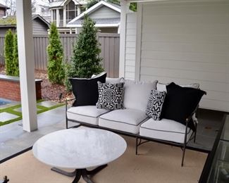 Summer Classics Roma sofa with pillows in Sunbrella fabric with Pottery Barn Jayne marble-top coffee table
