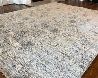 Silk hand-knotted area rug