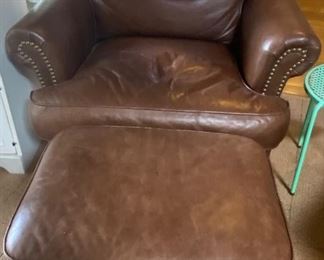 Two Brown Leather Chairs with Ottomans
