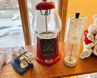 Gumball machine, vintage toy iron, antique medical jar