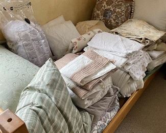 Sheets, pillows, blankets and bedding