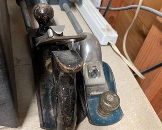 Large selection of tools, wood scraps and hardware