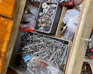 Large selection of tools, wood scraps and hardware