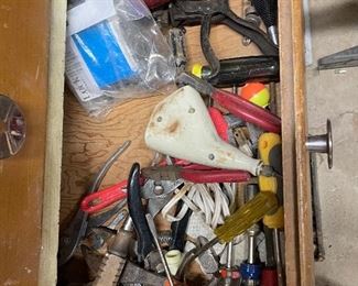 Large selection of tools, wood scraps and hardware