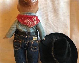 Back of Buddy Lee - with original Lee red bandana. Hat band says: “Ride’em in Lee copper-riveted cowboy pants". Note: It feels like one of his legs has come loose inside his jeans...
