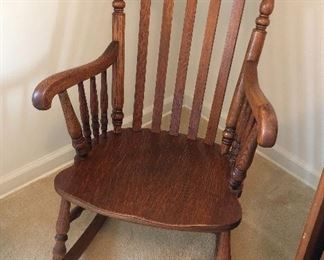 Antique oak rocking chair by Indianapolis Chair & Furniture Co. (22”W, 32”D, 37” high at back) 