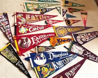 Just some of the 60+ vintage souvenir pennants. From Washington, Oregon, Alaska, Canada & beyond. Note early Disneyland with Tinkerbell & Seattle Centennial (1952)