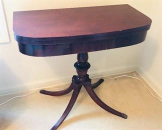 Mersman mahogany game table. As shown 32”L, 16”D, 30”H. Top flips open & spins.