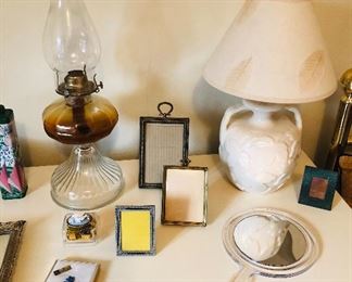 Hurricane lamp, assorted frames, vintage white pottery lamp with leaf design