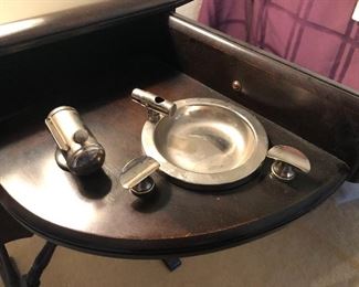 Drawer in smoking stand - spins open to reveal ashtray & built-in lighter.