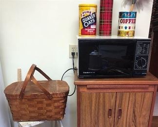 Picnic basket, microwave/kitchen cart, tins