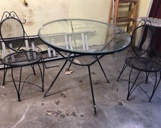 Glass top patio table (36” diameter) & 2 chairs