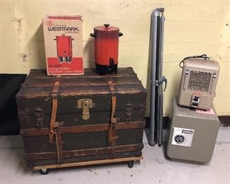 Old trunk (with leather straps intact!), vintage coffee maker, projector screen, small safe, heater