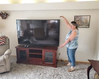 70" Sharp Aquos Television. ANOTHER 60" Sharp in the Bedroom