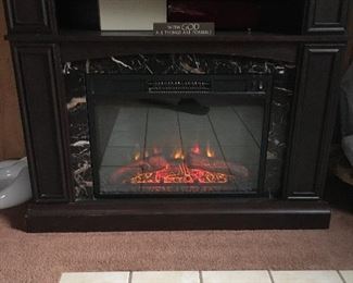 Electric fireplace with heat