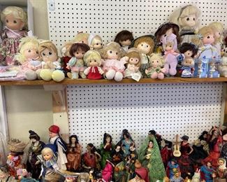 precious moment's dolls, above average souvenir dolls