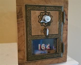Vintage Post Office Box encased in wood. Very cool.