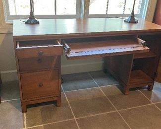 Ethan Allen Continental Double Pedestal Desk. Current retail price of $3,750.00. Center drawer opens and can fold down for keyboard. Right side opens for cabinet storage of paper or CPU. Left side has 2 drawers and one file drawer.
H: 31". W: 60". D: 24". Excellent condition. PRICE $950