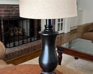 Oil rubbed bronze urn form lamp (not real bronze) H: 23.25". Width at top of shade: 8". Width at base of lamp: 5" PRICE $40