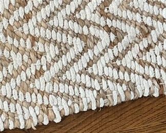West Elm Chevron stripe Jute rug. 9'6" x 12'4".
Slight wear pattern in the area between coffee table and sofa PRICE $225
