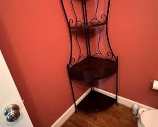 Metal corner shelf with one drawer. Shelves will lift and unit can be folded H: 74". W: 25". D: 17" PRICE $50