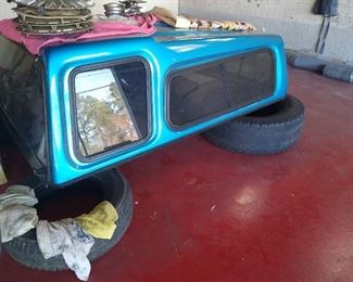 Camper shell for mid size short bed truck