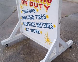 Very nice wooden rolling shop sign