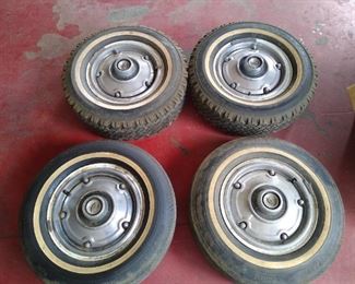 Chevrolet truck rims with hubcaps and white walls