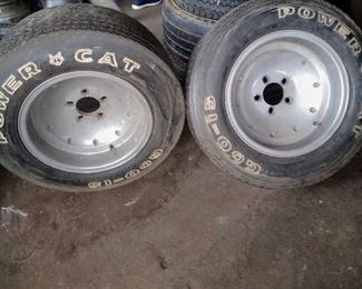 Old school aluminum rims with power cat tires