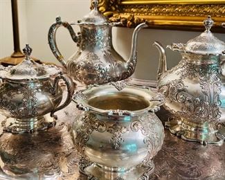 'Duchess' 5 piece hand chased sterling silver tea set by Frank M. Whiting Company. Coffee pot 43.08 oz troy, Teapot 39.93 oz troy, Sugar Bowl with lid 23.18 oz troy, Waste bowl 15.50 oz troy & Creamer 15.63 oz troy. Total weight over 137 oz troy. Style # 6727