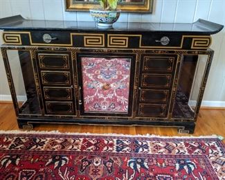 Rare & unusual Chinoiserie 1950's sideboard with Chinese key motif, with side beveled glass display areas; measures 19" D x 66" L x 36" T.