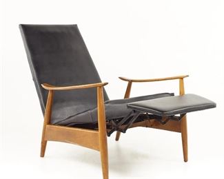 Milo Baughman Recliner, #74, by Thayer Coggin/DWR, designed in 1966; dark brown leather/walnut.             New, from DWR, expect to pay $5K.