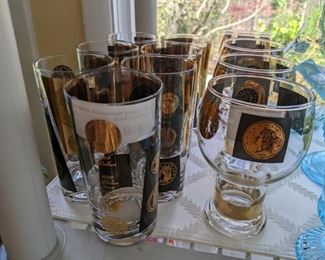 Vintage black and 22-Karat gold coin design glassware, by Cera.