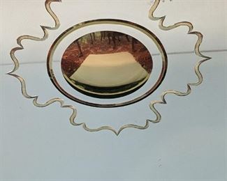 Detail of mirrored front of the Chinoiserie sideboard.