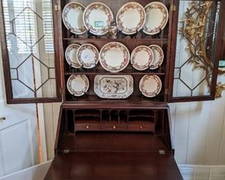 1940's English mahogany drop-front secretary, with original brass pulls, pencil inlay and oval burl wood inset.