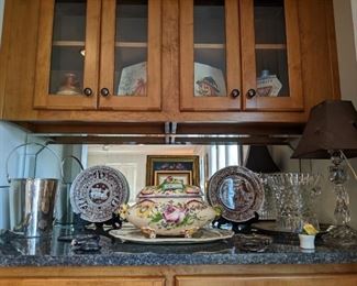 Bar goodies, including large 3-piece hand-painted French porcelain tureen, Irish cut class ice bucket, silver-plated ice bucket, vintage American glass table lamp and original art.