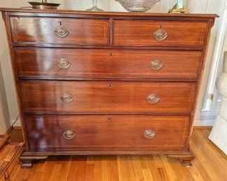 This chest is amazing in person - a true antique, ca. 1830's, with original brass pulls, banded burl wood top, pencil inlay, canted corners, reverse ogee bracket feet and perfect patina!