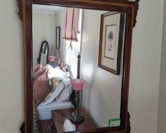 Antique banded fretwork mahogany wall mirror.