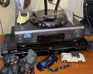 Gorilla Figurines, Collectible Cars, DVD Player, VHS Player