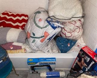 Lots of Afghans and Bedding