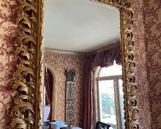 LARGE CARVED WOOD GILT MIRROR