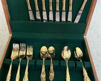 F.B. Rogers, 50 piece gold tone stainless steel flatware. 