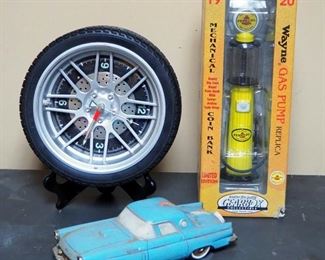 GearBox Pennzoil Gas Pump Coin Bank, In Original Box, Battery Operated Tire Clock On Stand, And Ezra Brooks 1956 Ford Thunderbird Decanter
